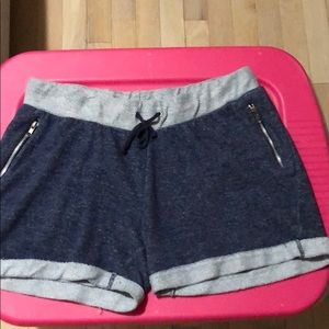 Blue cotton shorts with zipper pockets